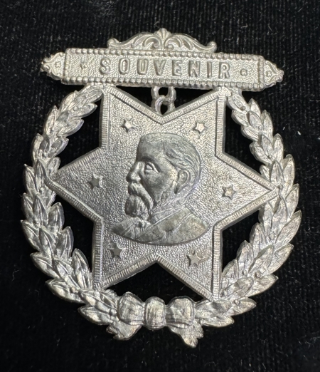 Political 1884 JAMES BLAINE 1 1/2″ x 2″ EMBOSSED WHITE METAL BADGE, SCARCE & NEAR-MINT