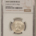 New Certified Coins 1961 AUSTRALIA SILVER 1 SHILLING MINT ERROR, CURVED CLIP (5.48G) – NGC MS-62