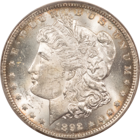 Dollars 1892-CC $1 MORGAN DOLLAR – PCGS MS-63, LUSTROUS WHITE CARSON CITY!