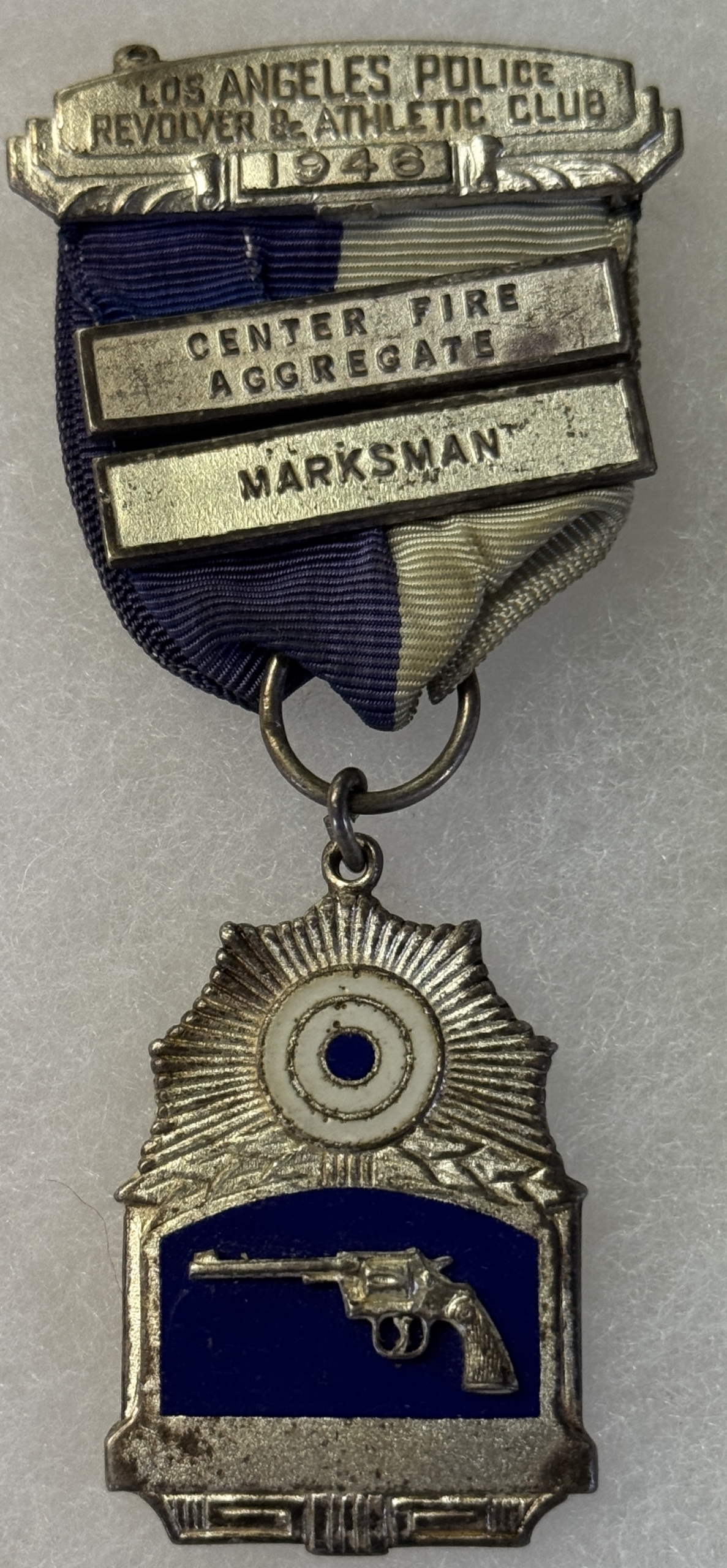 Miscellaneous LOT OF 3 VINTAGE POLICE BUTTONS/PINS INCLUDING 1946 LA POLICE S&W MARKSMAN MEDAL Miscellaneous LOT OF 3 VINTAGE POLICE BUTTONS/PINS INCLUDING 1946 LA POLICE S&W MARKSMAN MEDAL