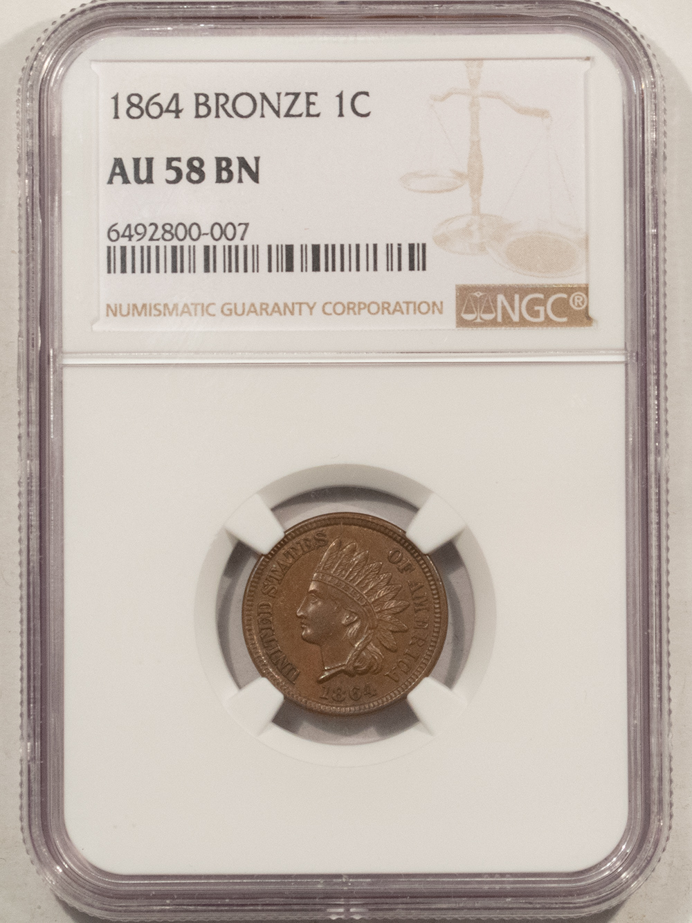 Indian 1864 INDIAN CENT, BRONZE – NGC AU-58 BN Indian 1864 INDIAN CENT, BRONZE – NGC AU-58 BN