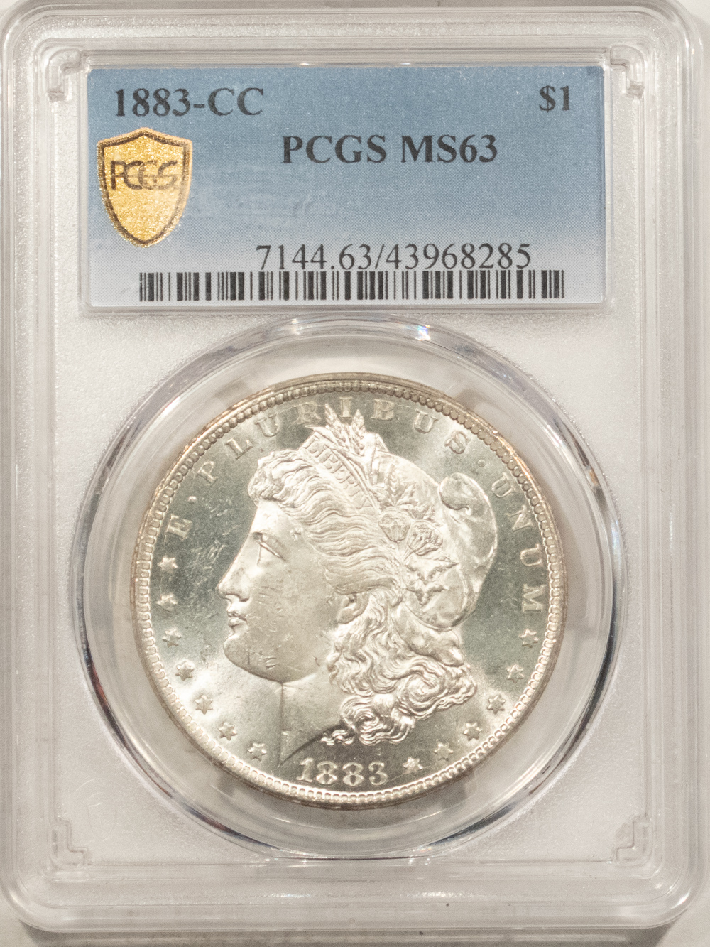 Dollars 1883-CC $1 MORGAN DOLLAR – PCGS MS-63 BLAST WHITE, LOOKS PL! CARSON CITY! Dollars 1883-CC $1 MORGAN DOLLAR – PCGS MS-63 BLAST WHITE, LOOKS PL! CARSON CITY!