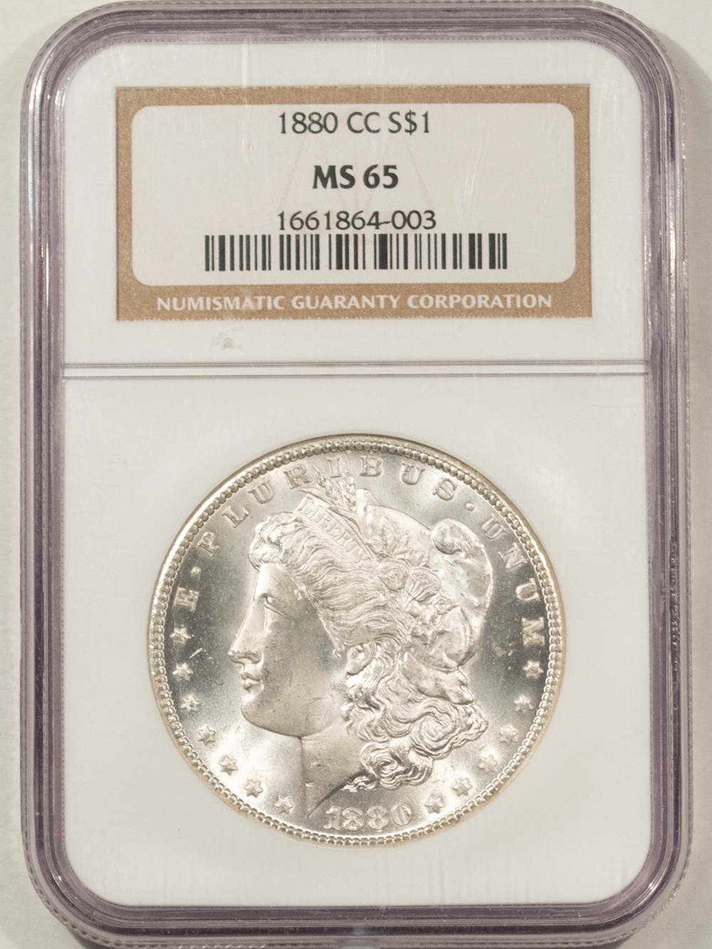 Dollars 1880-CC $1 MORGAN DOLLAR – NGC MS-65, BLAST WHITE PREMIUM QUALITY! CARSON CITY! Dollars 1880-CC $1 MORGAN DOLLAR – NGC MS-65, BLAST WHITE PREMIUM QUALITY! CARSON CITY!