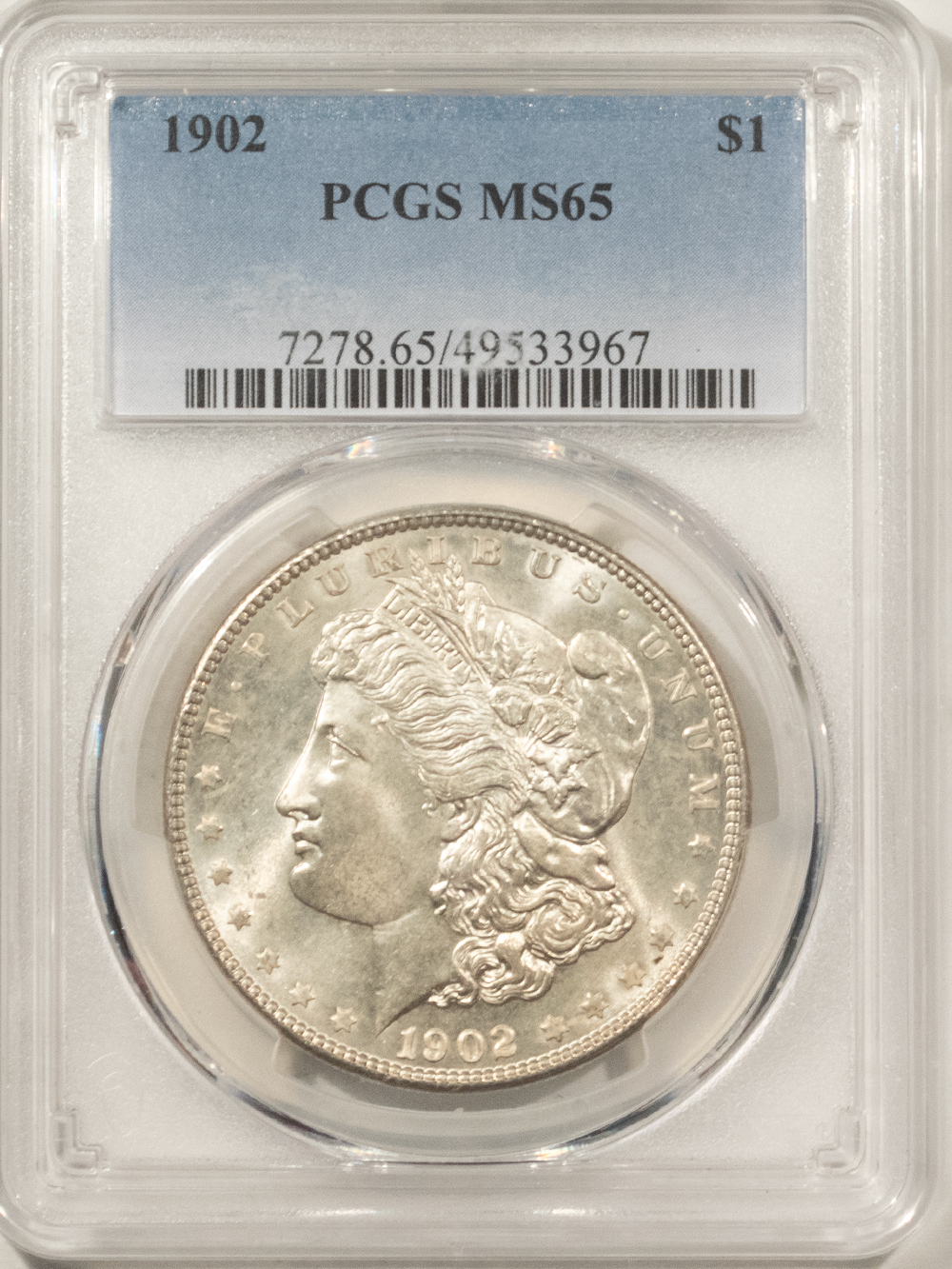 Dollars 1902 $1 MORGAN DOLLAR – PCGS MS-65, WHITE & PREMIUM QUALITY! Dollars 1902 $1 MORGAN DOLLAR – PCGS MS-65, WHITE & PREMIUM QUALITY!
