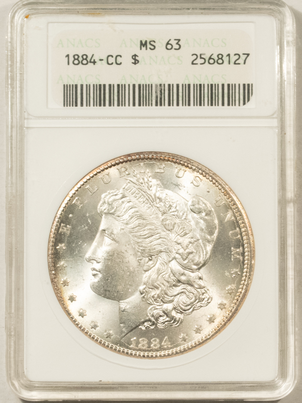 Dollars 1884-CC $1 MORGAN DOLLAR – ANACS MS-63, SOAPBOX HOLDER! CARSON CITY! Dollars 1884-CC $1 MORGAN DOLLAR – ANACS MS-63, SOAPBOX HOLDER! CARSON CITY!