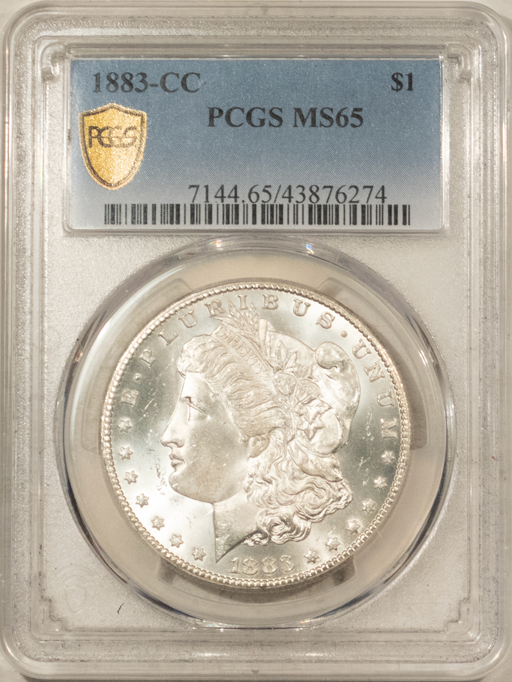 Dollars 1883-CC $1 MORGAN DOLLAR – PCGS MS-65, BLAST WHITE CARSON CITY! Dollars 1883-CC $1 MORGAN DOLLAR – PCGS MS-65, BLAST WHITE CARSON CITY!
