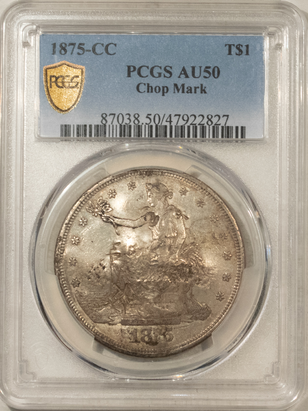 Dollars 1875-CC $1 TRADE DOLLAR, CHOP MARK – PCGS AU-50, CARSON CITY! Dollars 1875-CC $1 TRADE DOLLAR, CHOP MARK – PCGS AU-50, CARSON CITY!
