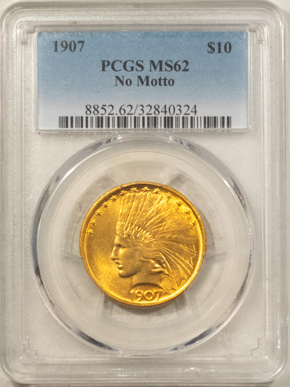 $10 1907 $10 INDIAN HEAD GOLD EAGLE, NO MOTTO – PCGS MS-62, MARK-FREE! ATTRACTIVE! $10 1907 $10 INDIAN HEAD GOLD EAGLE, NO MOTTO – PCGS MS-62, MARK-FREE! ATTRACTIVE!