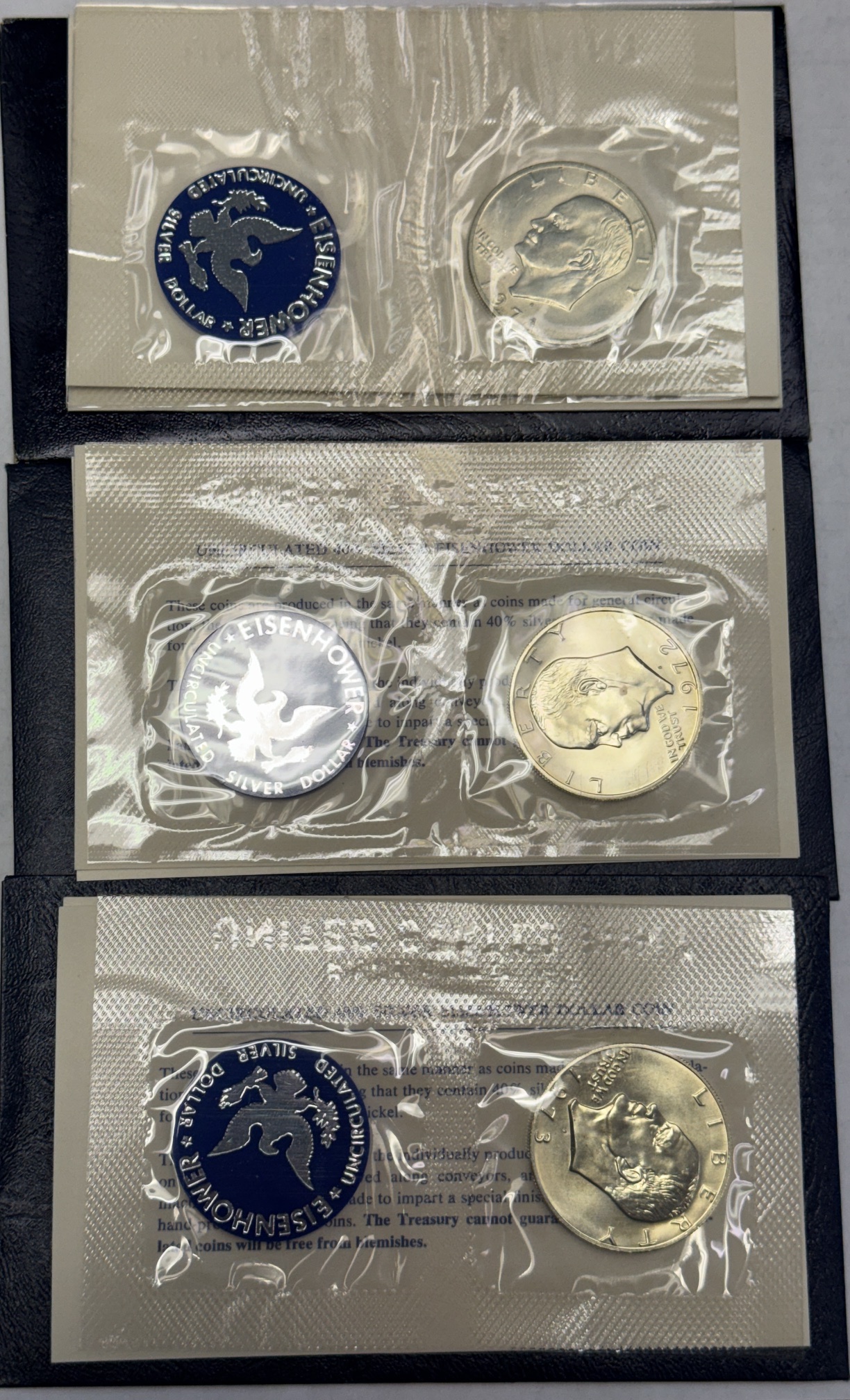 Dollars 1971, 72, 73S 40% SILVER UNCIRCULATED EISENHOWER BLUE PACK 3 COIN LOT GEM W/ OGP Dollars 1971, 72, 73S 40% SILVER UNCIRCULATED EISENHOWER BLUE PACK 3 COIN LOT GEM W/ OGP