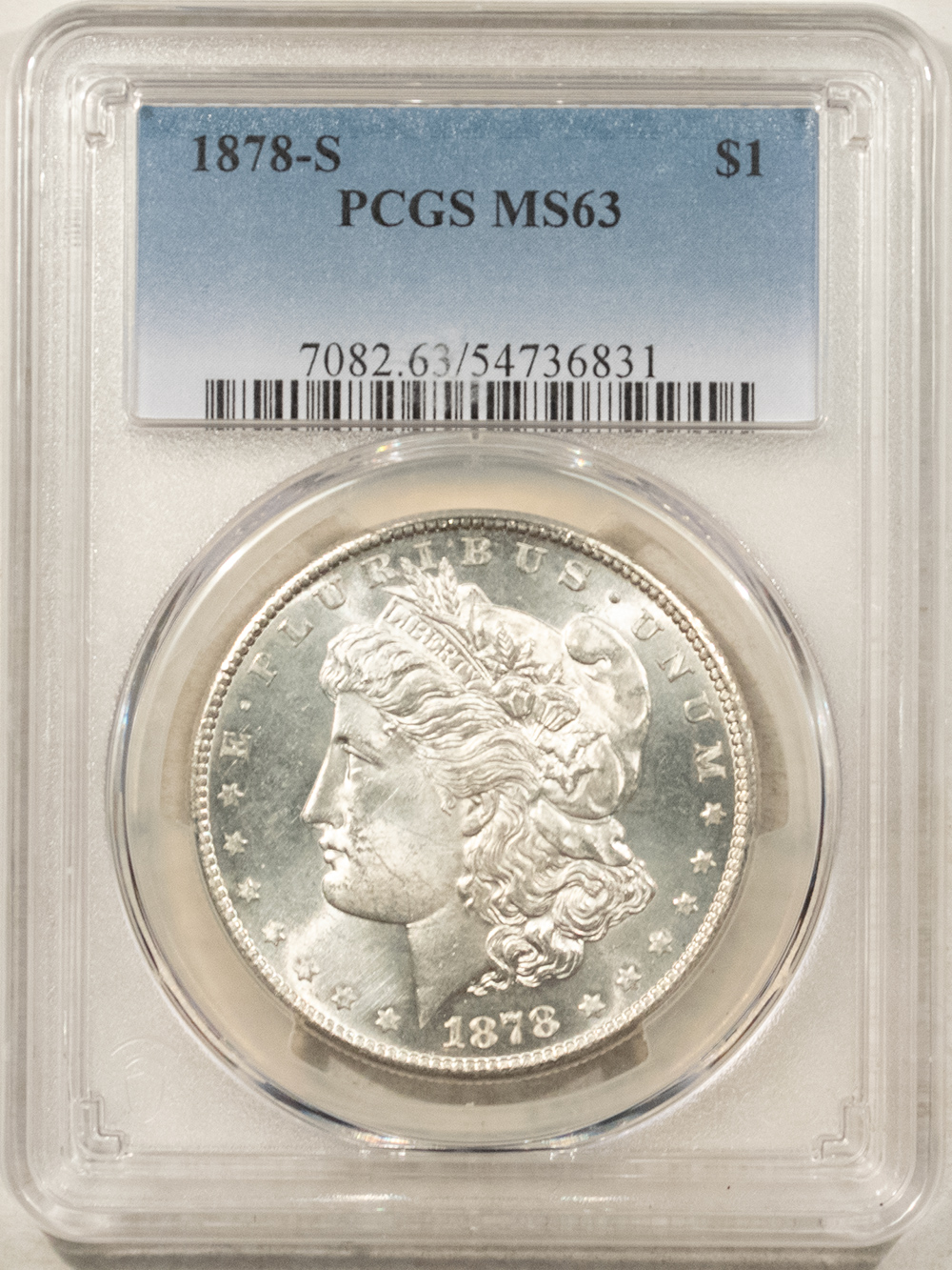 Dollars 1878-S $1 MORGAN DOLLAR – PCGS MS-63, BLAST WHITE W/ SEMI-MIRRORED FIELDS Dollars 1878-S $1 MORGAN DOLLAR – PCGS MS-63, BLAST WHITE W/ SEMI-MIRRORED FIELDS