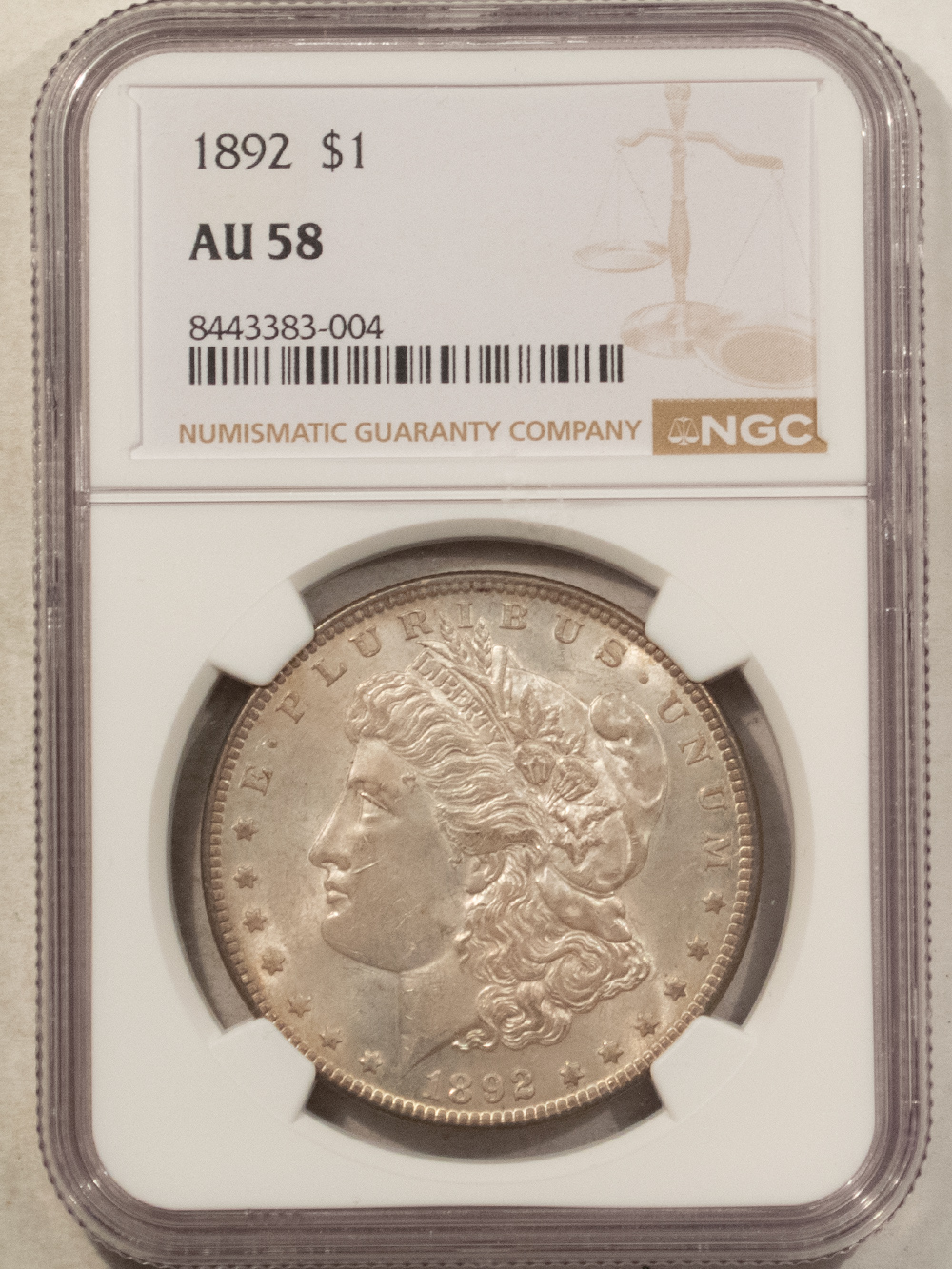 Dollars 1892 $1 MORGAN DOLLAR – NGC AU-58 Dollars 1892 $1 MORGAN DOLLAR – NGC AU-58