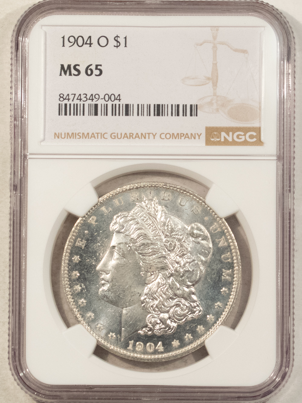 Dollars 1904-O $1 MORGAN DOLLAR – NGC MS-65, WHITE GEM & LOOKS PROOFLIKE TO US! Dollars 1904-O $1 MORGAN DOLLAR – NGC MS-65, WHITE GEM & LOOKS PROOFLIKE TO US!