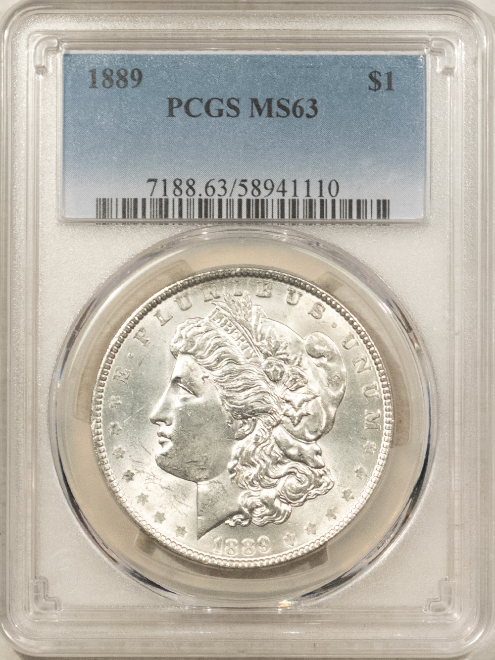 Dollars 1889 $1 MORGAN DOLLAR – PCGS MS-63 BLAST WHITE & LOOKS BETTER! Dollars 1889 $1 MORGAN DOLLAR – PCGS MS-63 BLAST WHITE & LOOKS BETTER!