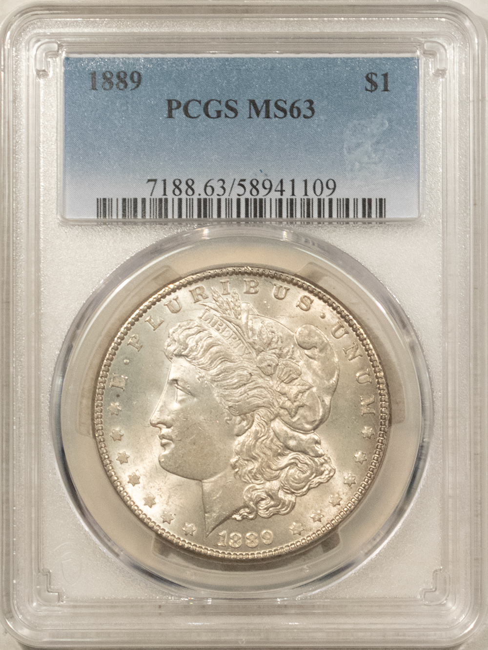 Dollars 1889 $1 MORGAN DOLLAR – PCGS MS-63 Dollars 1889 $1 MORGAN DOLLAR – PCGS MS-63