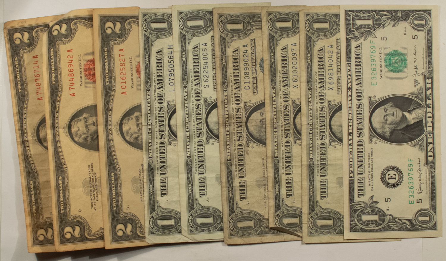 New Store Items 1953-1963 MIXED 9 NOTE LOT, $1 & $2 US NOTES, SILVER CERTS/BARR NOTE, CIRCULATED New Store Items 1953-1963 MIXED 9 NOTE LOT, $1 & $2 US NOTES, SILVER CERTS/BARR NOTE, CIRCULATED