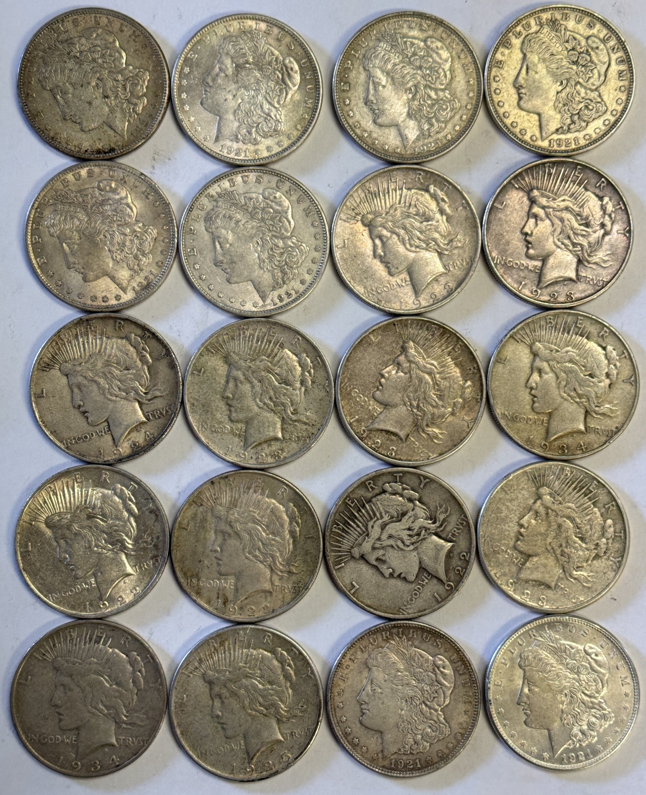 Dollars 1921 MORGAN & MIXED PEACE DOLLARS, 20 COIN ROLL – HIGH GRADE CIRCULATED EXAMPLES Dollars 1921 MORGAN & MIXED PEACE DOLLARS, 20 COIN ROLL – HIGH GRADE CIRCULATED EXAMPLES