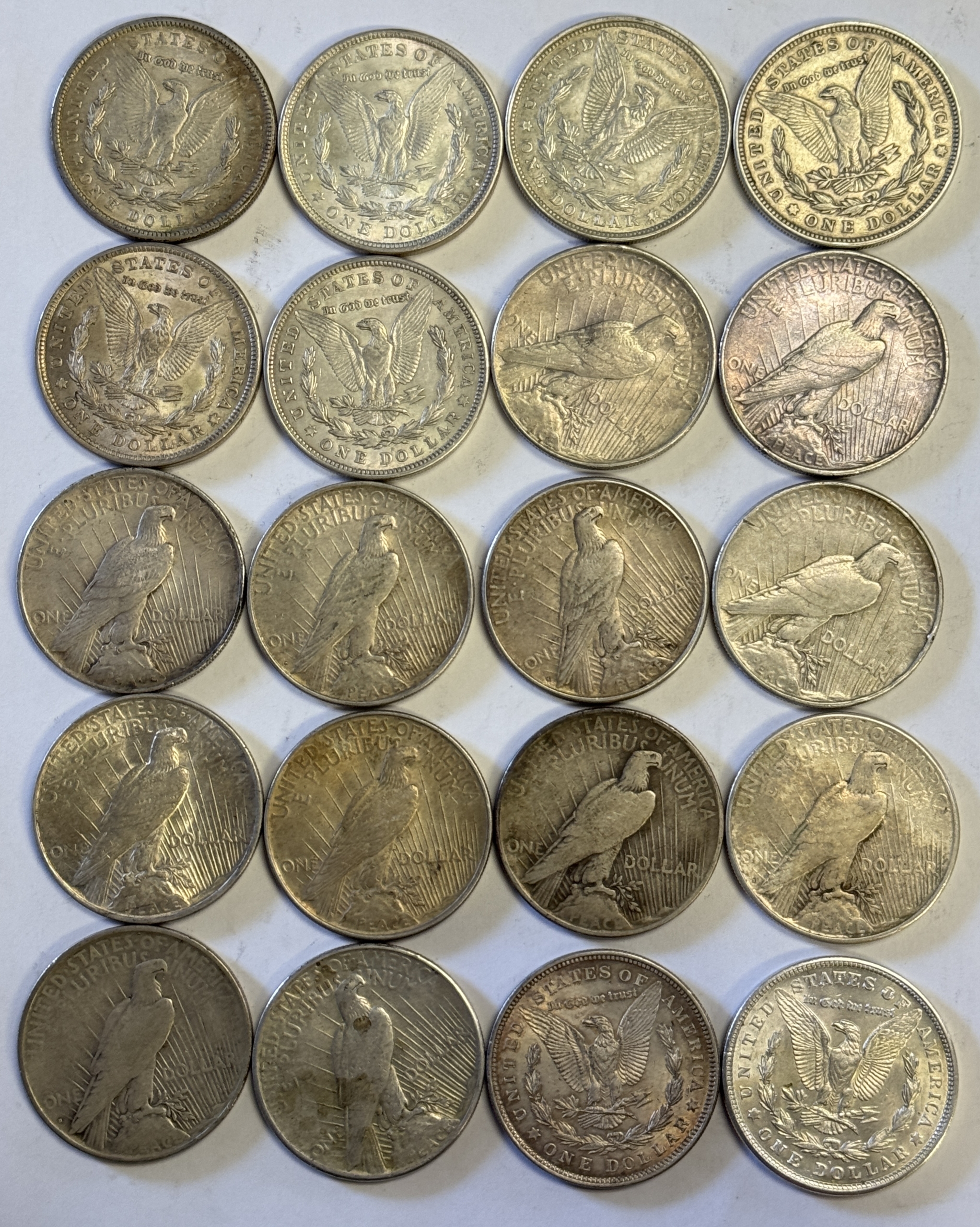 Dollars 1921 MORGAN & MIXED PEACE DOLLARS, 20 COIN ROLL – HIGH GRADE CIRCULATED EXAMPLES Dollars 1921 MORGAN & MIXED PEACE DOLLARS, 20 COIN ROLL – HIGH GRADE CIRCULATED EXAMPLES