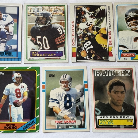 New Store Items 1973-90 TOPPS FOOTBALL 7 CARD LOT: ROOKIES, BUTKUS, PAYTON, YOUNG, AIKMAN, SMITH
